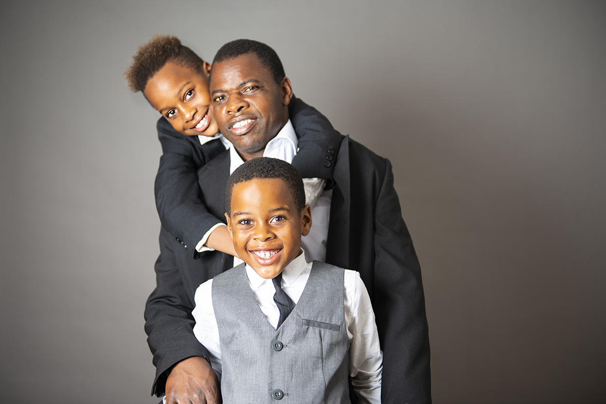 studio portrait dad and sons