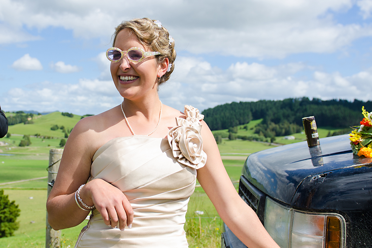 bride and her sunglasses - fun, love, happiness - weedding, Northland NZ